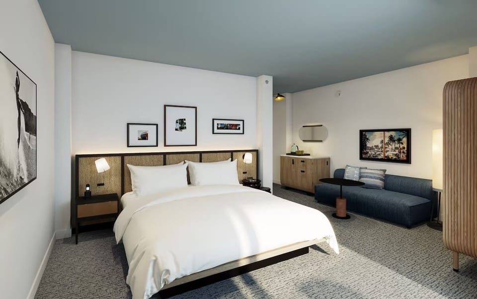 Stretch out after adventures with a cozy lounge beside bed.