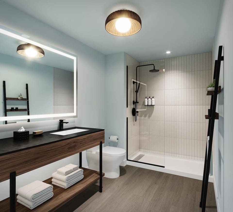 Start your day with a glowing mirror and fresh towels.