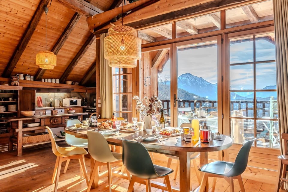 dining area with stunning view, open space with kitchen and living room