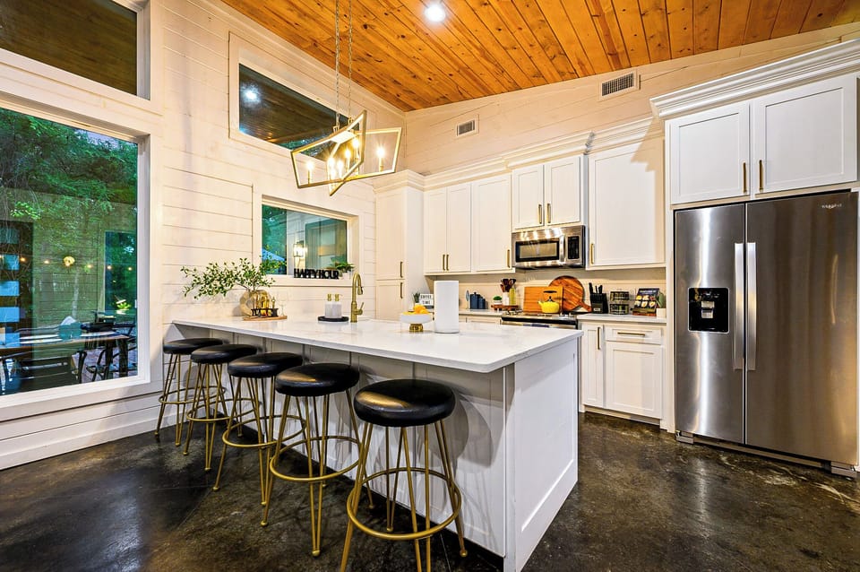 With Additional seating for 4 at the bar