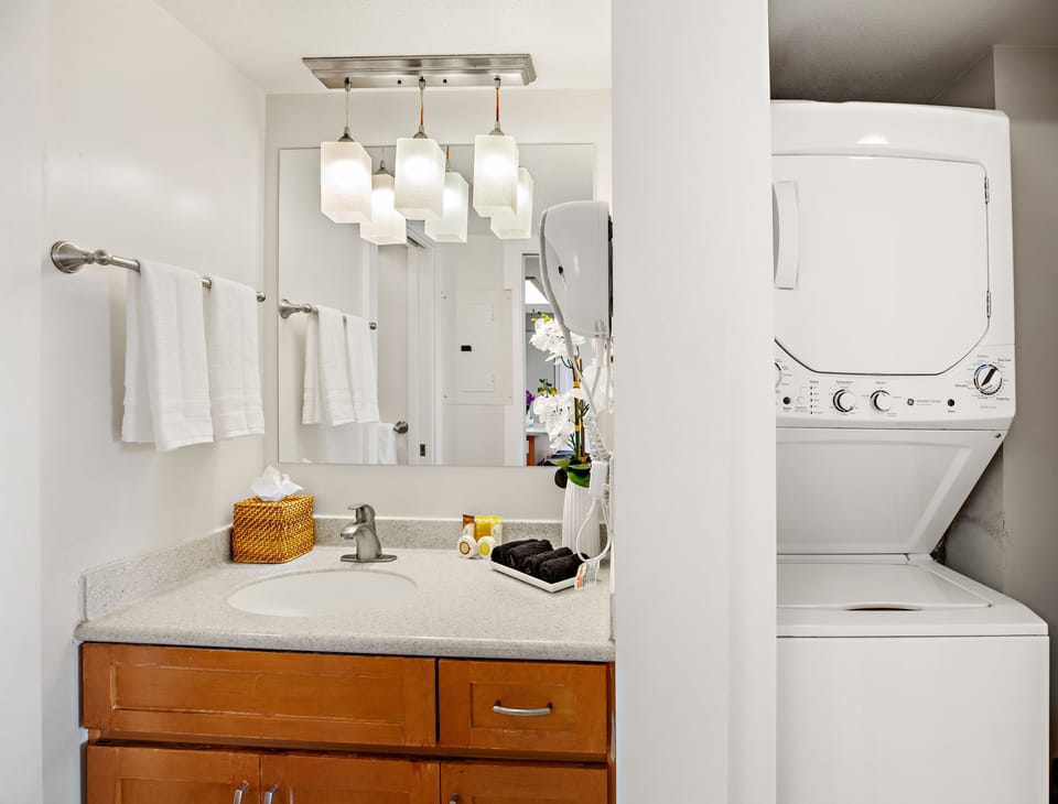 Combined Bathroom & Laundry Area. Enjoy the convenience of having laundry facilities right next to the bathroom.