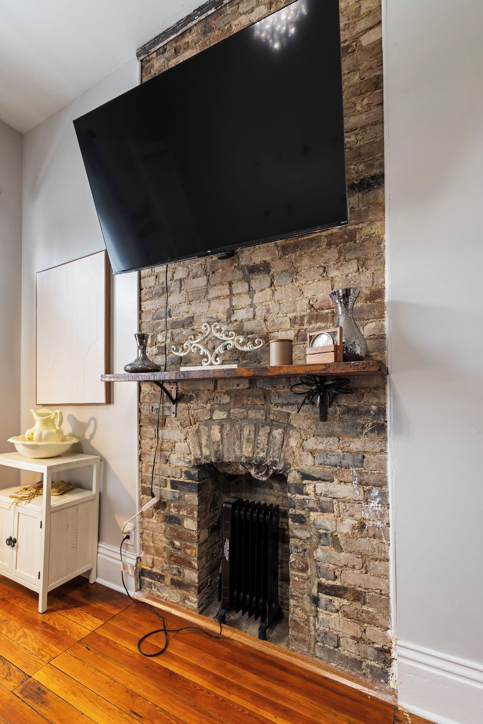 Living Room: Stylish blend of brick charm and modern comfort