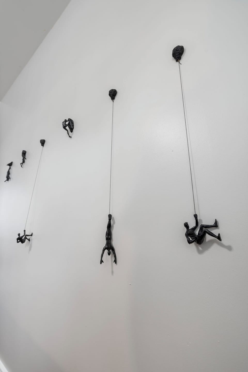 Enjoy playful wall art featuring daring climbers that spark creativity.