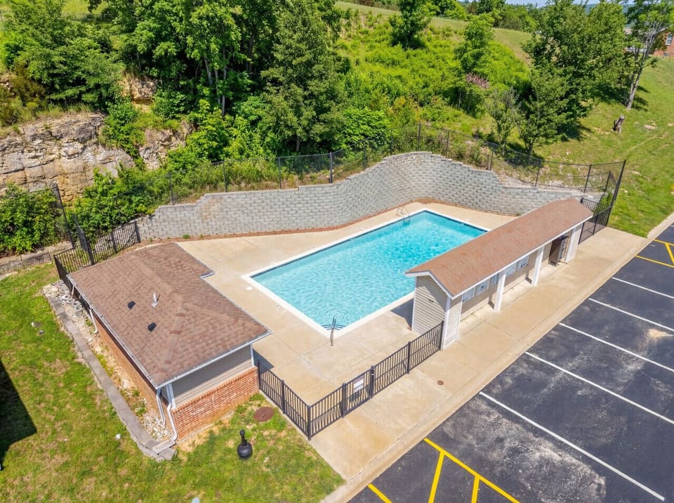 Community pool with a shallow end for little swimmers, open Memorial Day to Labor Day and a short walk from the door.
