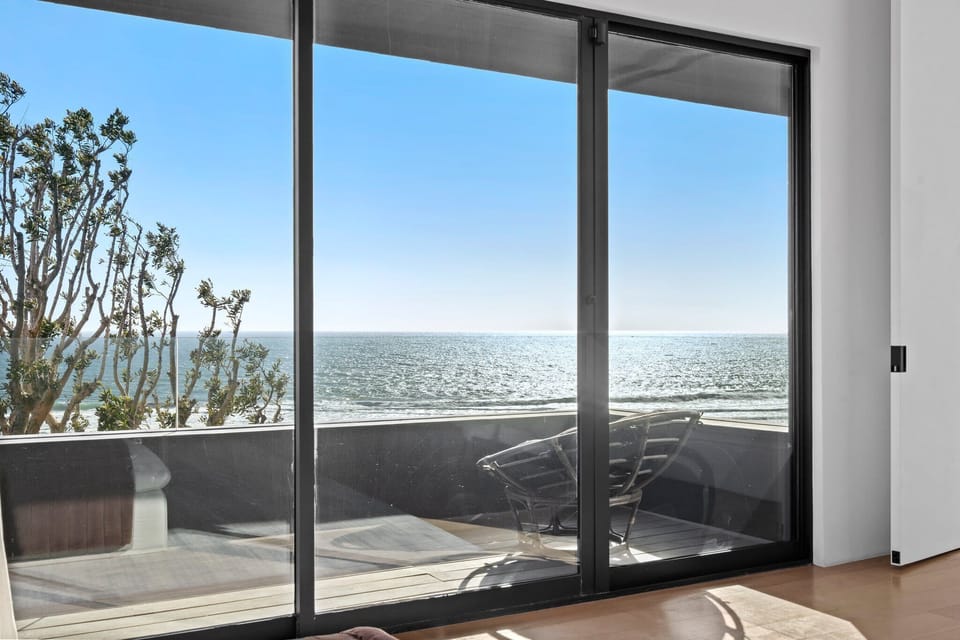 An effortless transition from refined interiors to open-air serenity.
