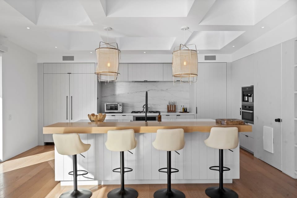 A chef’s dream kitchen with high-end appliances and seamless flow.