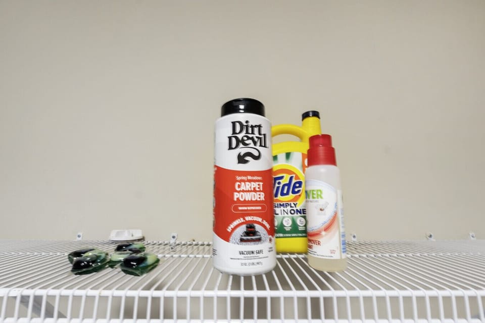 A stocked cleaning supply shelf to help keep your space fresh and tidy during your stay.