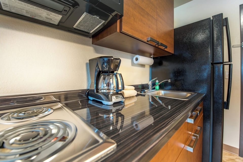 Prep dinner effortlessly with ample workspace and bright task lighting.