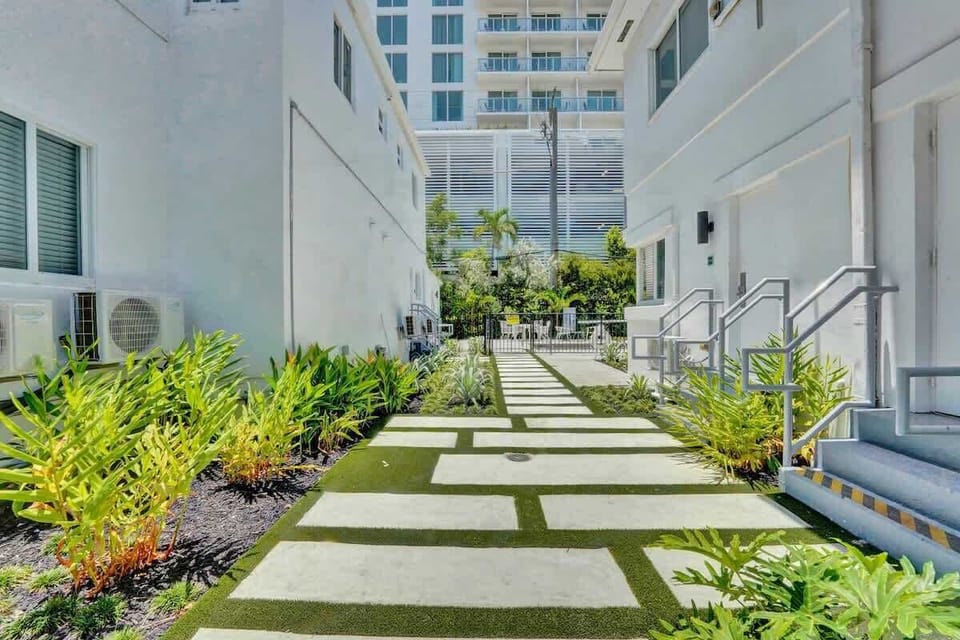 Lush landscaped courtyard pathway