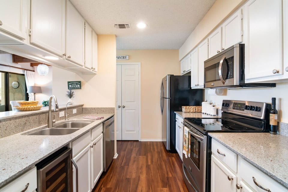Spacious kitchen complete with wine fridge