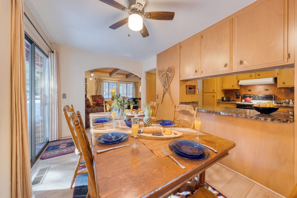 Dining table is situated near the kitchen.