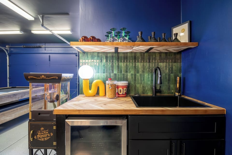 Mini bar in the game room with vintage popcorn maker