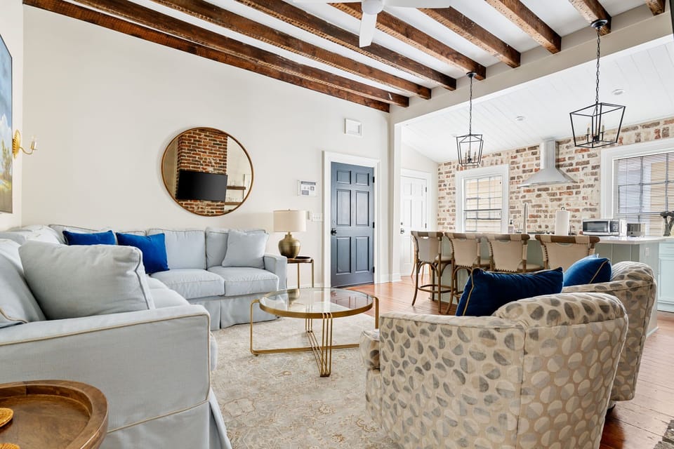 Stylish lounge with modern decor and natural light.