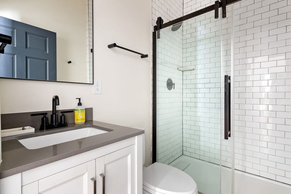 A space that invites deep breaths and longer showers.