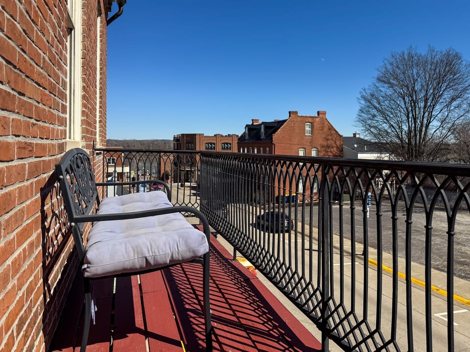 Quaint balcony with Missouri River view in downtown Washington, MO at the Tamm Loft.
