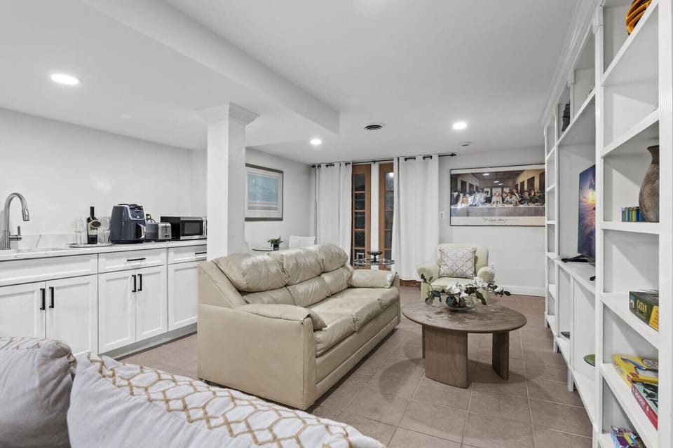 Settle in, stream your favorite shows, or dive into a good book in this inviting living space.