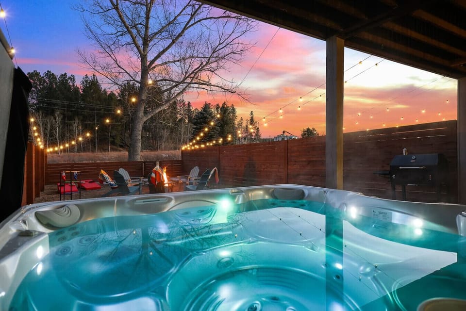 Let the sunset paint the sky while the hot tub melts the stress away.