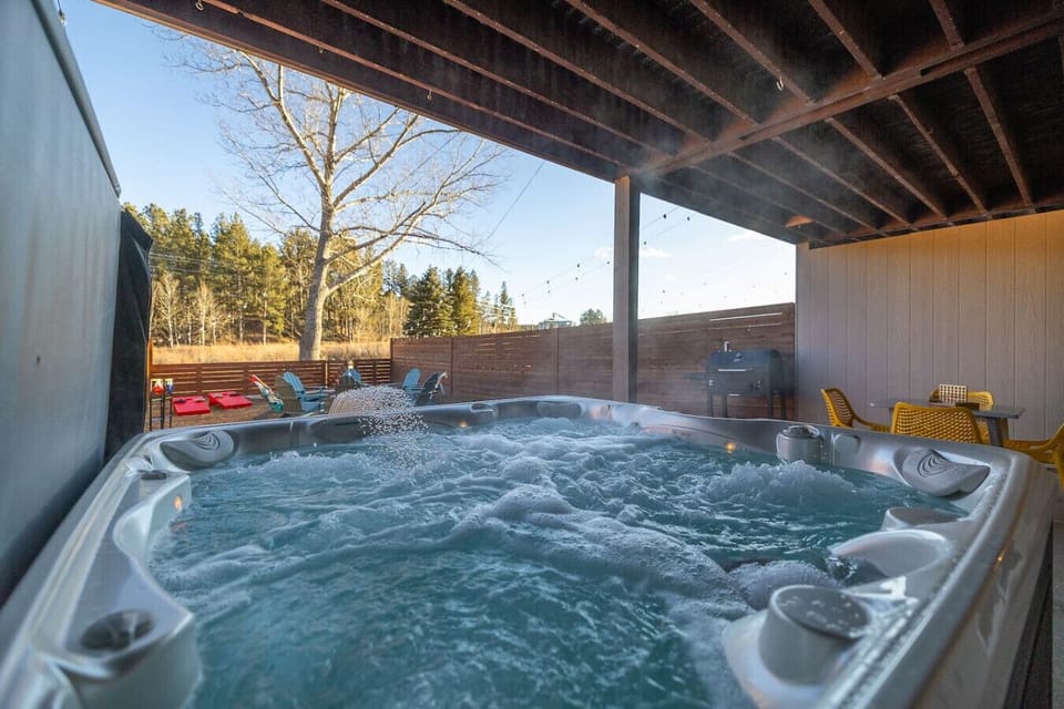 Unwind under the open sky—warm bubbles, fresh air, and space to gather and play.