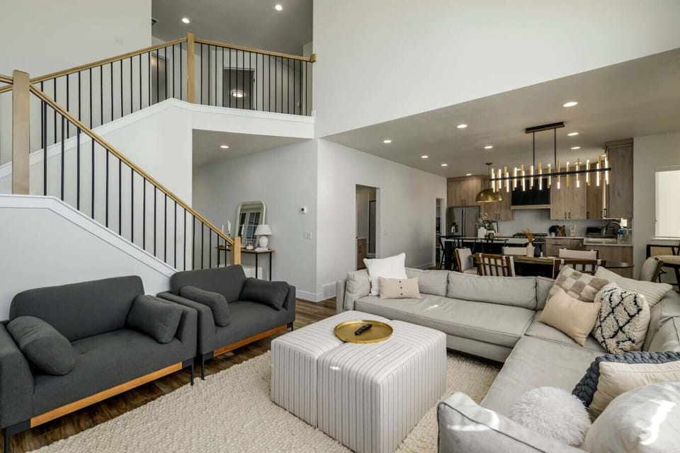 Spacious living room flowing into dining and kitchen