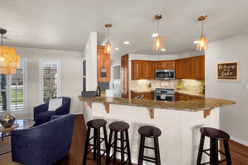 Open living, dining and kitchen area. Fully stocked kitchen. 