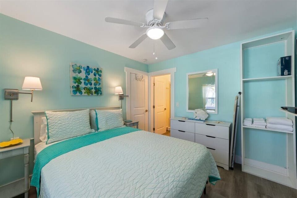 Find your peaceful retreat in this calming bedroom.