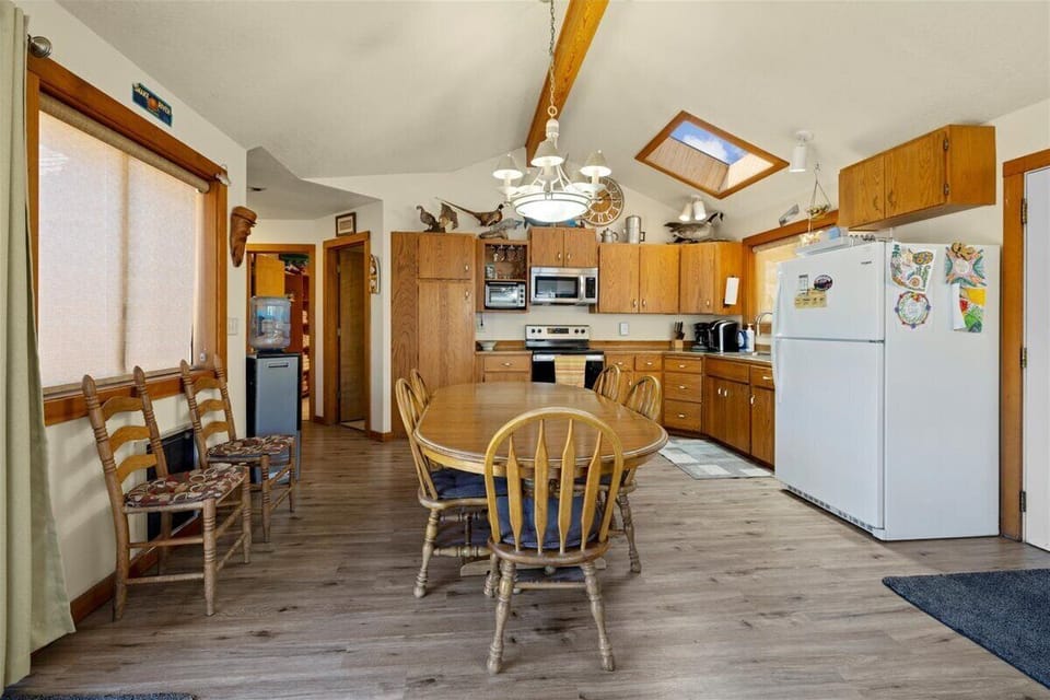 Dining room & kitchen open layout. Cook while you enjoy the fantastic views.