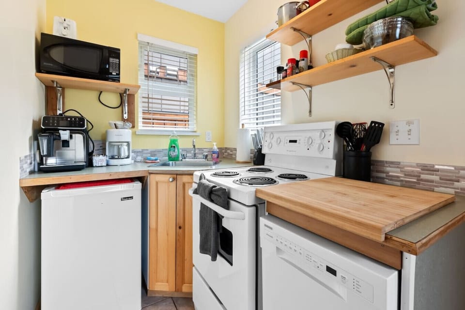 Cook like you’re at home with a fully equipped kitchenette, including a stove, oven, and dishwasher.