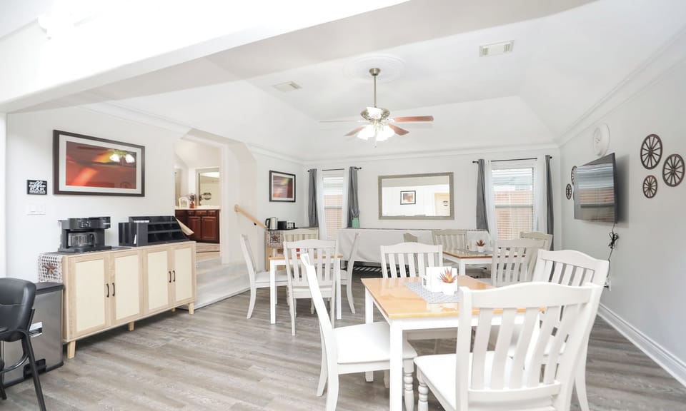 Dining area of the main house. Space can sit 12 people with Smart TV 
