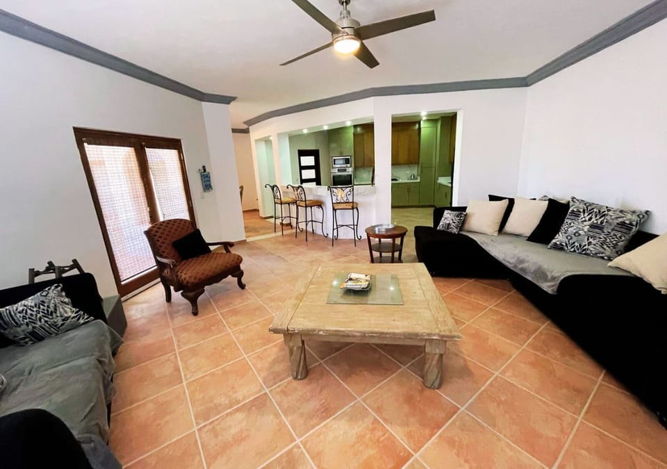 Additional living space offering guests more room to spread out. Comfortable seating and a flat-screen TV make this a great spot for a quieter lounge area away from the main living room.