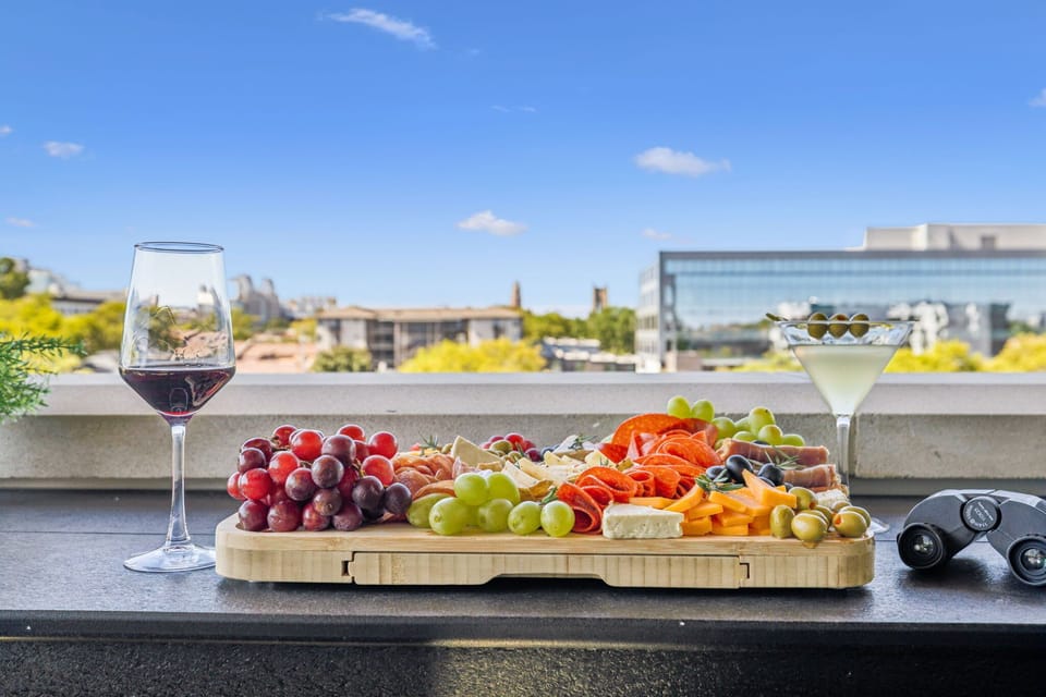 FANTASTIC sunsets over the row out on the large balcony. 2 person bar table and a rocking chair. A beautiful view of Vanderbilt Universities West End Tower. 