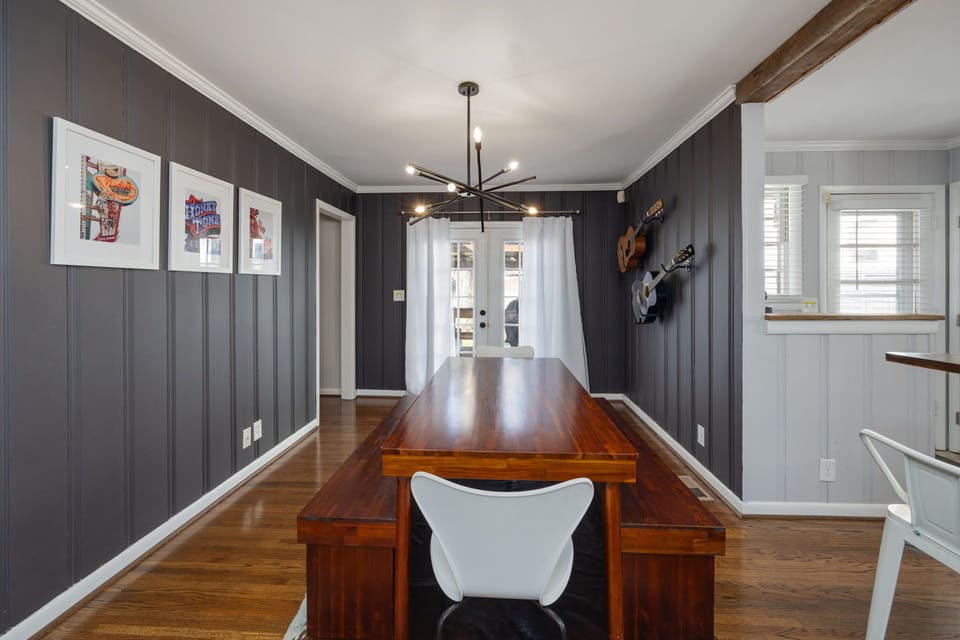 Stylish wooden table and modern decor perfect for gatherings and memorable meals!