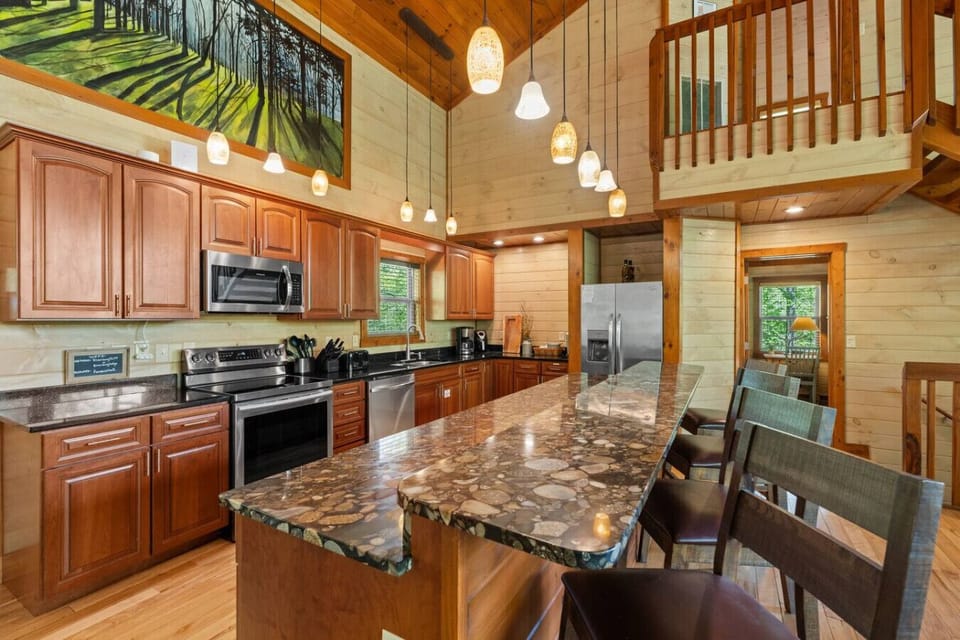 Cook in style with double ovens, built-in microwave, full-size fridge, dishwasher, toaster, coffee maker, blender, and all the cookware and utensils you need.
