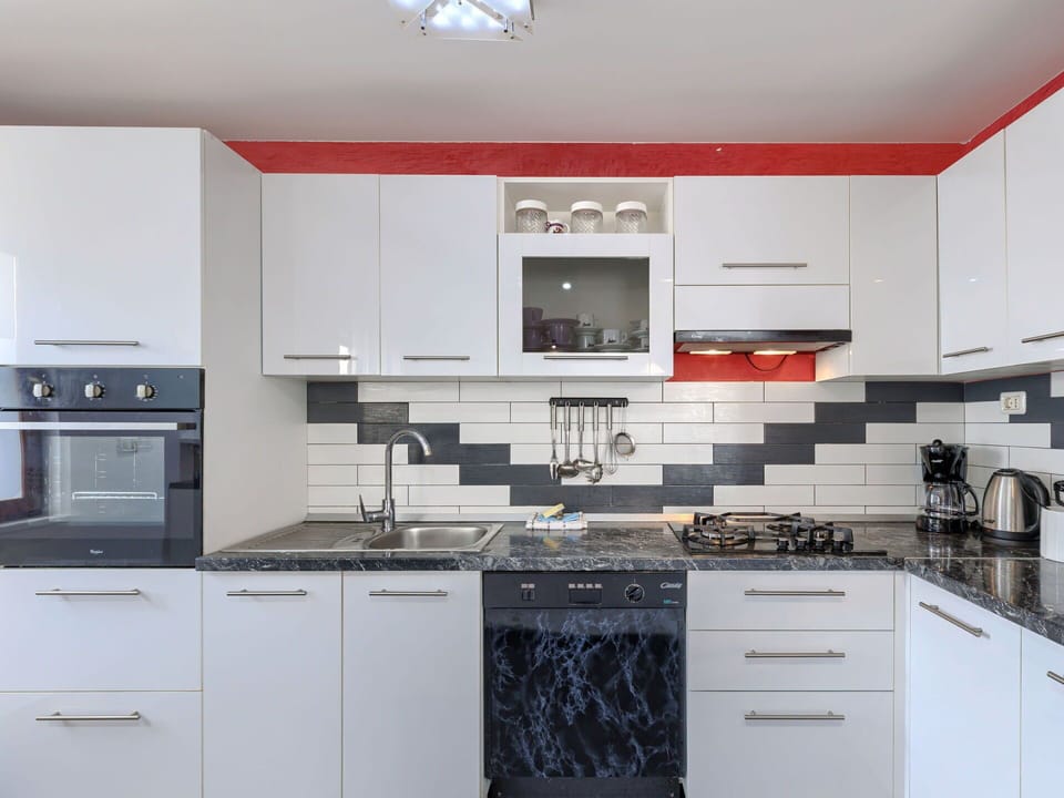 Kitchen, Kitchen Appliance, Countertop, Major Appliance, Kitchen Stove, Cabinetry, Stove, Home, Gas Stove, Interior Design