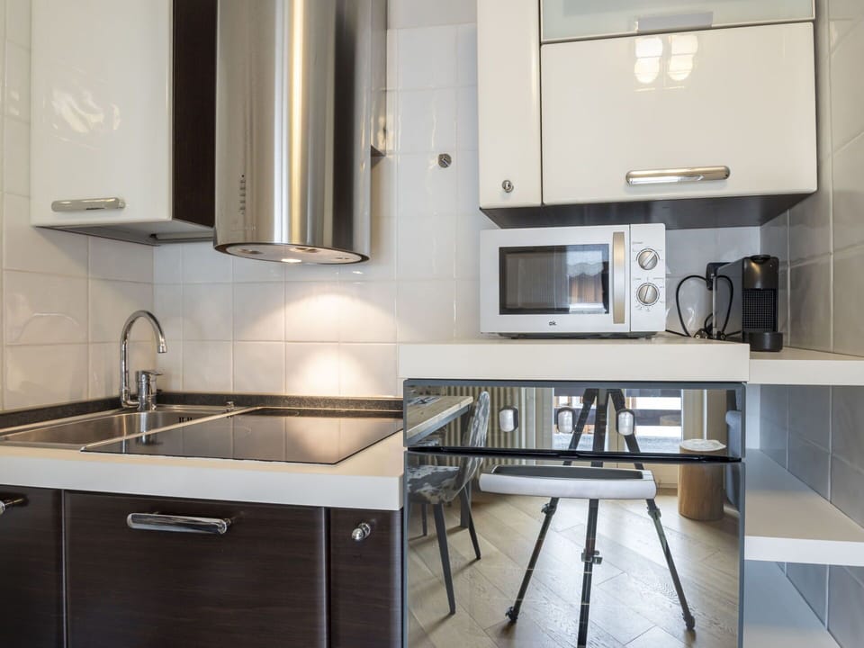 Kitchen Appliance, Kitchen, Countertop, Cabinetry, Furniture, Major Appliance, Home Appliance, Interior Design, Wood, Flooring