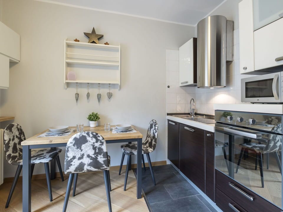 Furniture, Interior Design, Flooring, Wood, Kitchen Appliance, Kitchen, Countertop, Ceiling, Room, Floor