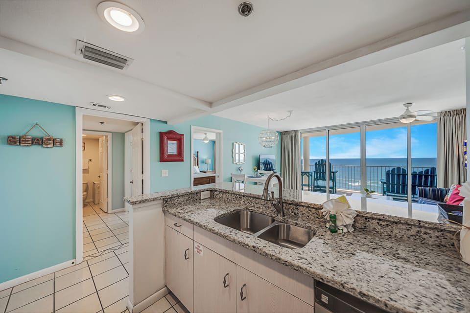 The fully equipped kitchen features granite countertops, stainless-steel appliances, and has everything you need to prepare meals for family & friends.
