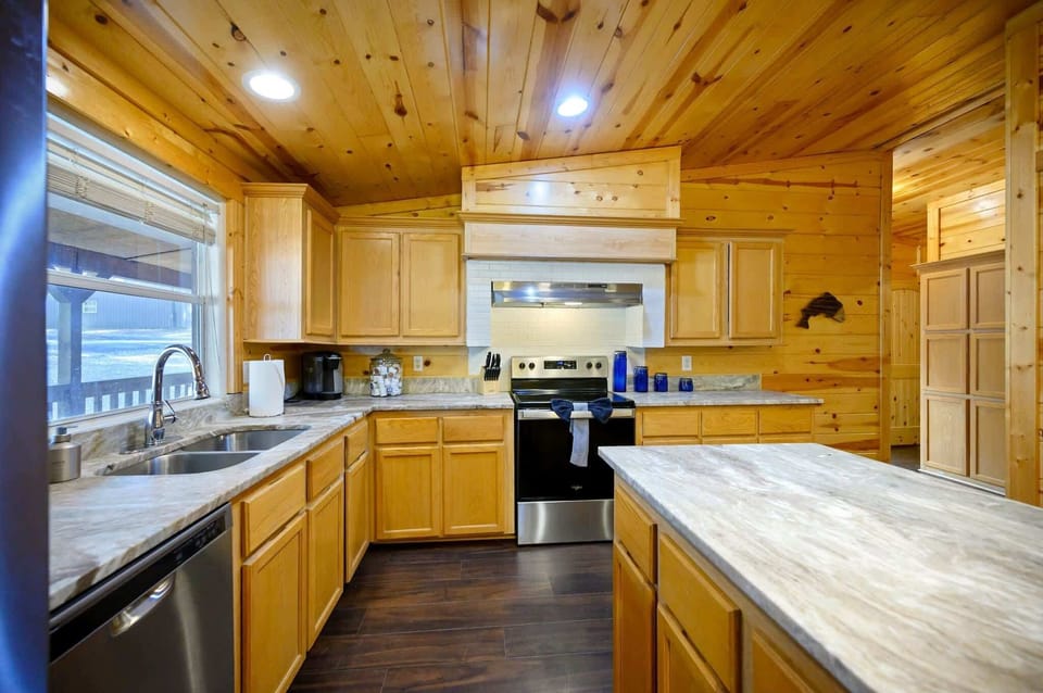 The open kitchen offers loads of space & every home comfort