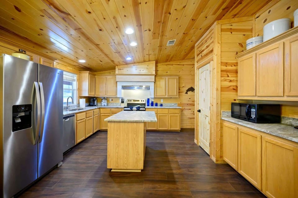 The open kitchen offers loads of space & every home comfort