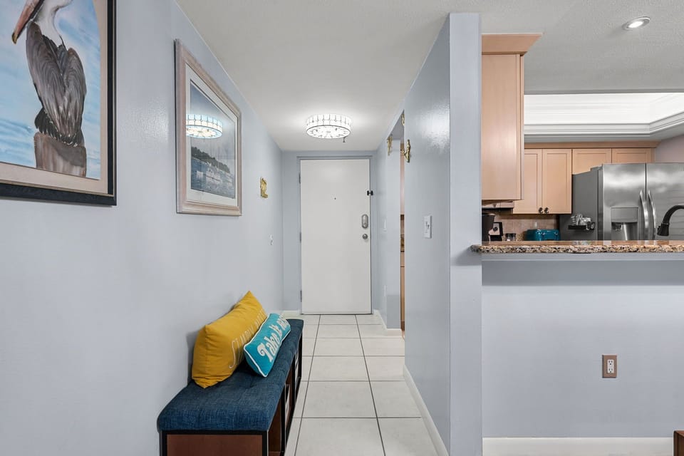 View of the front entrance door. The kitchen and dining room are at the front of the condo.