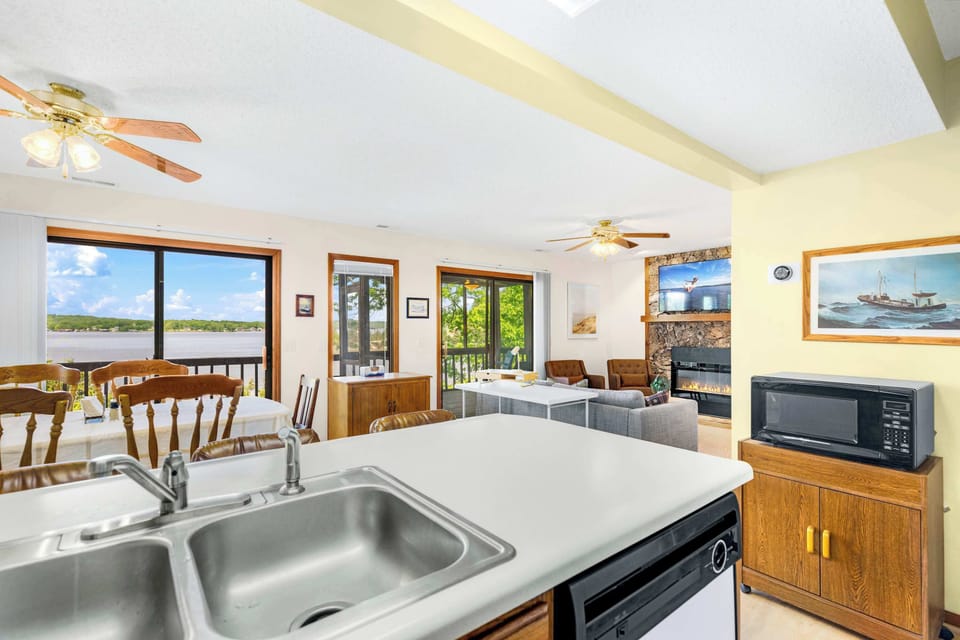 The open kitchen offers ample space & every home comfort