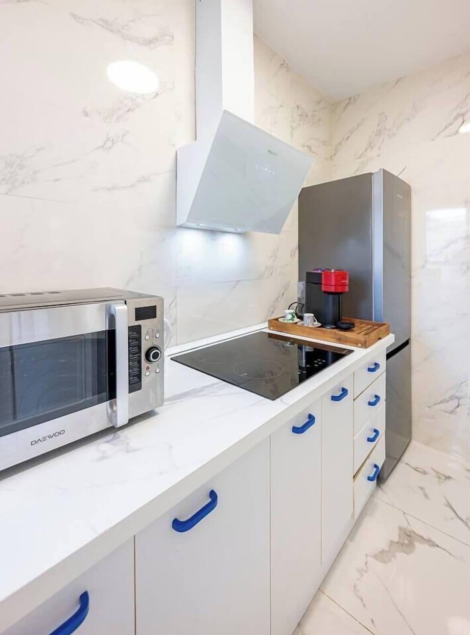 Kitchen: Fully equipped kitchen with appliances and washer, ideal for long stays. (2)