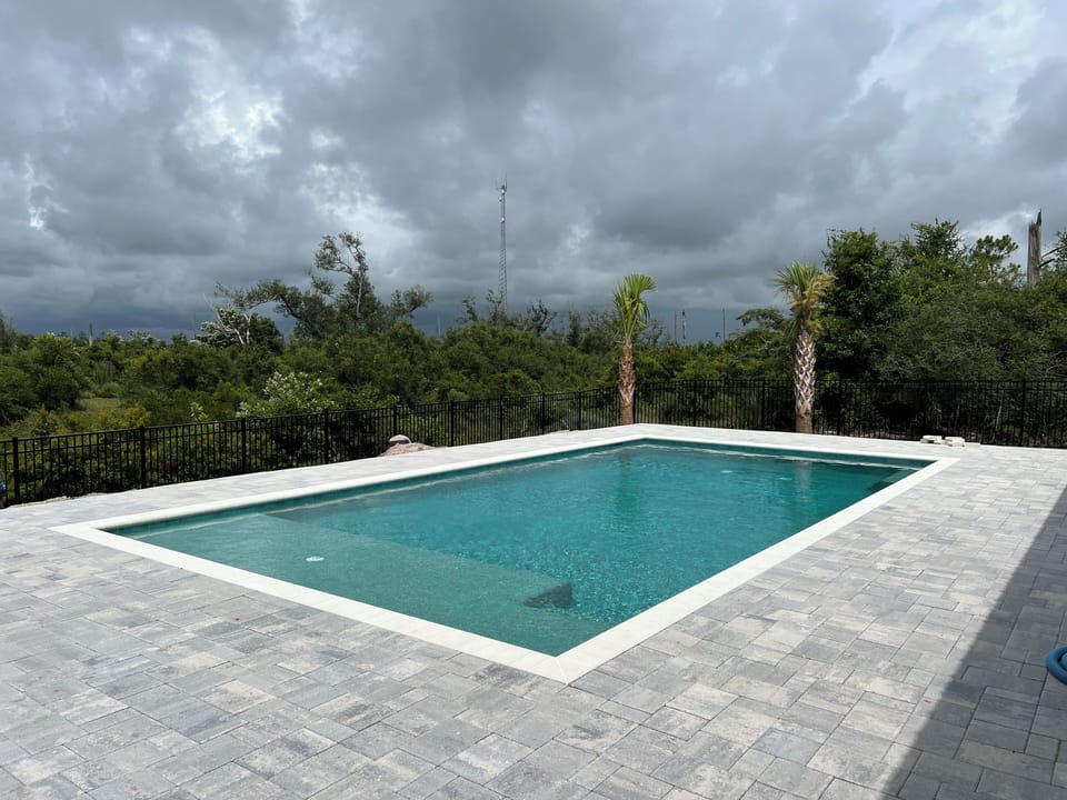 Pool with large sun shelf