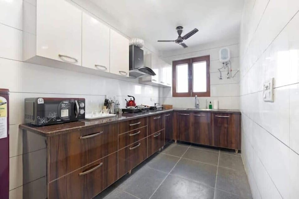 "Create culinary masterpieces in a space that inspires - where exquisite design and functionality meet, in the stunning and refined kitchen of your dreams."