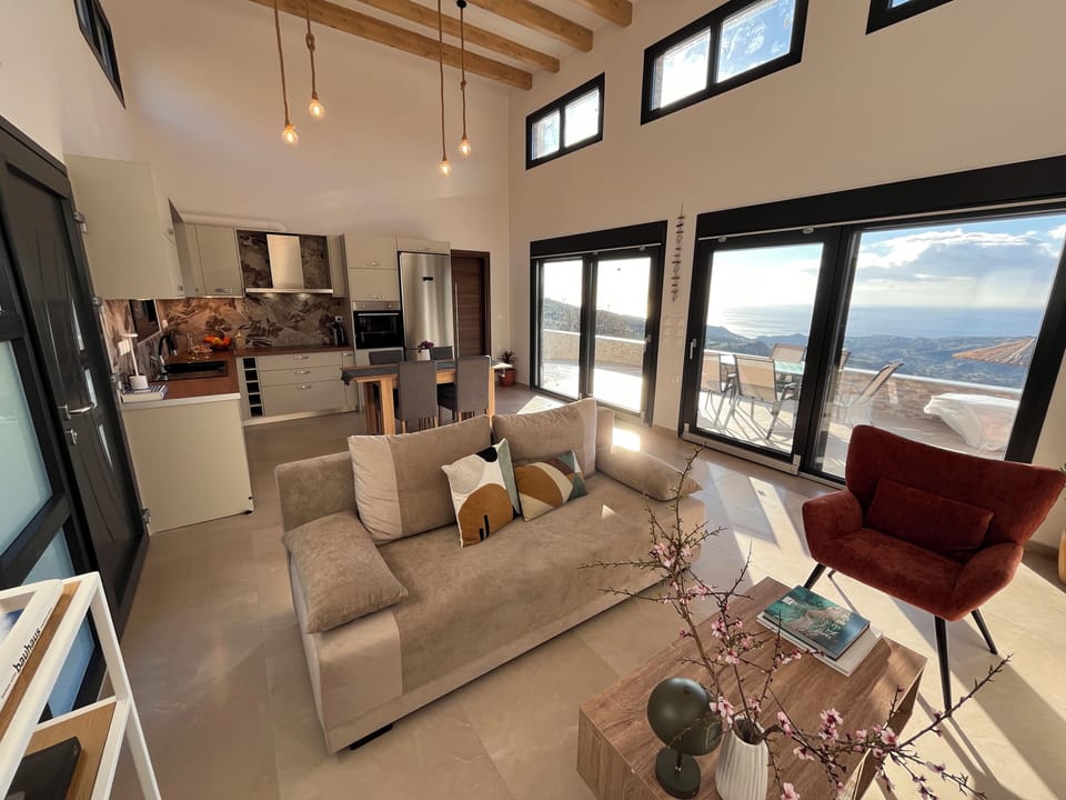 Living Room, Kitchen, Dining Area and Terrace with View