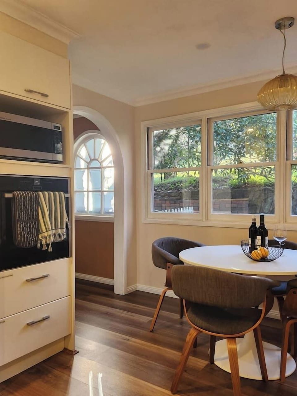 The kitchen nook is a favourite with the kids, or somewhere to chat with that important human preparing your meal. It's also a great spot to sit and work, if that's what you need to do!
