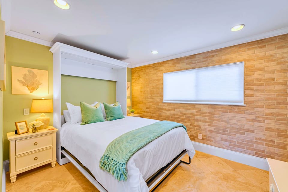 Cozy queen bedroom with a smart TV for your entertainment and relaxation.