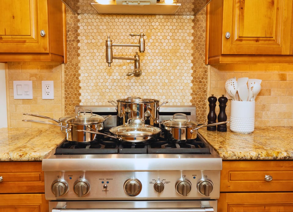 Experience a high-end chef’s kitchen with luxury finishes, a Sub-Zero fridge, Thermador appliances, and an espresso machine for the perfect start to your day.
