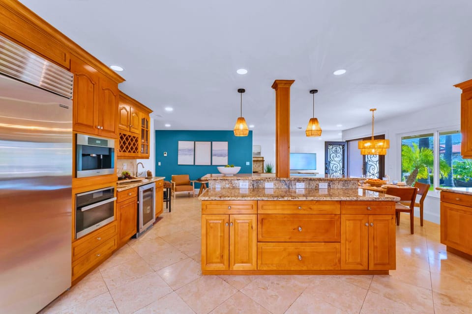 Experience a high-end chef’s kitchen with luxury finishes, a Sub-Zero fridge, Thermador appliances, and an espresso machine for the perfect start to your day.