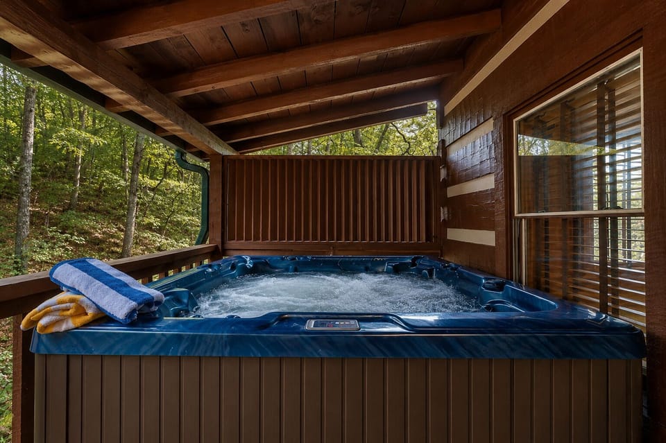 Unwind in the private hot tub while listening to the relaxing creek