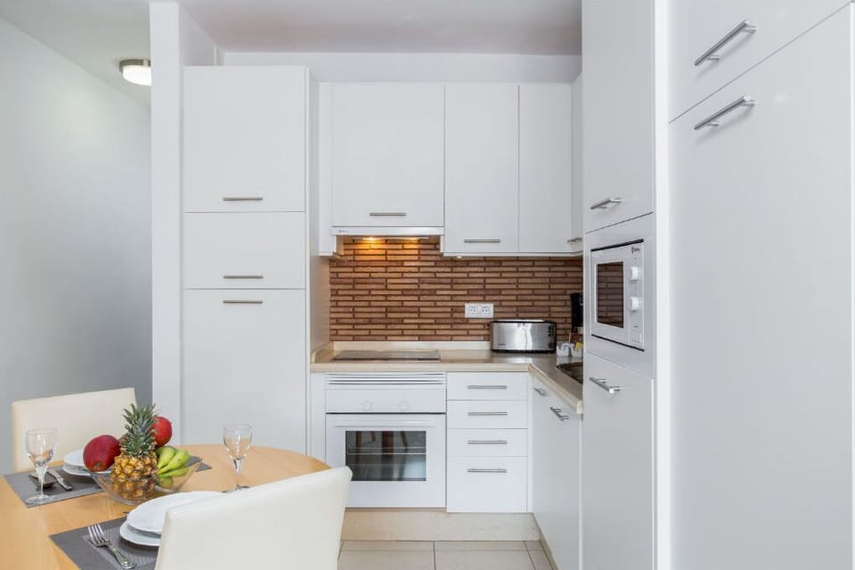 Prepare your favorite meals in our sleek kitchen.
